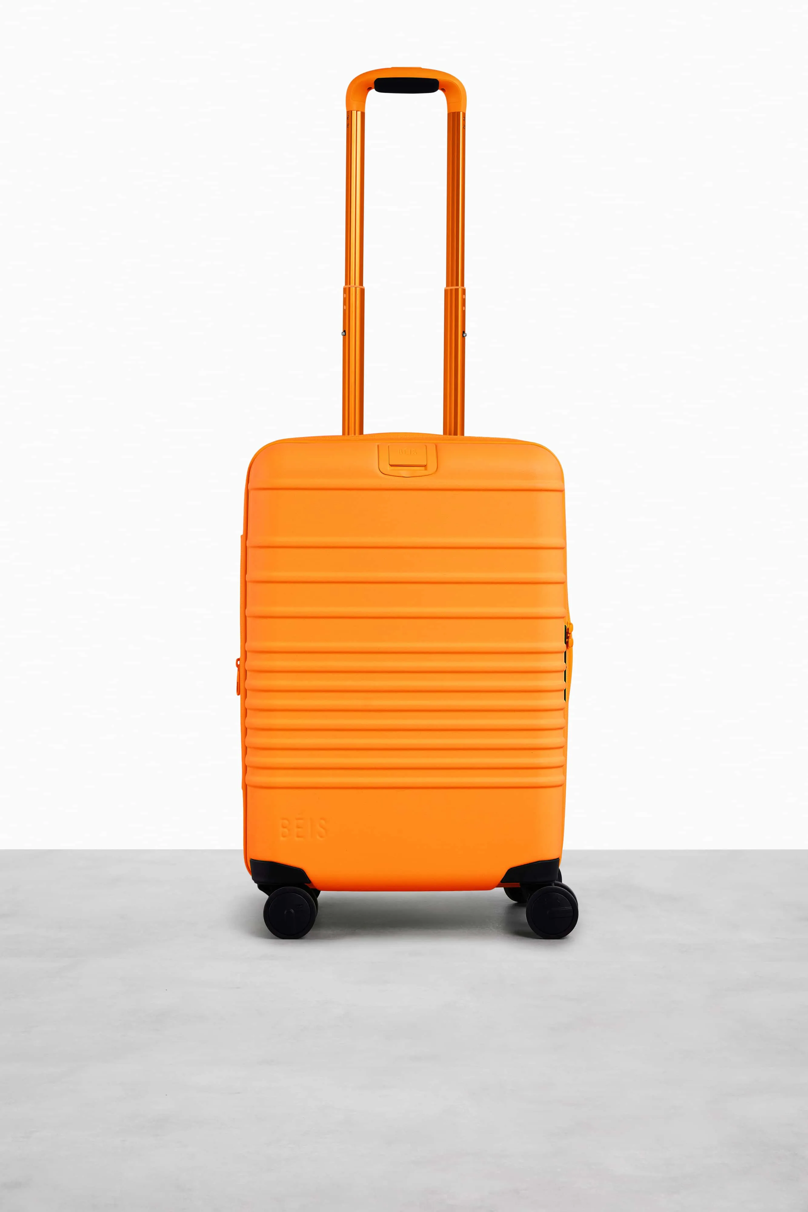 The Carry-On Roller in Creamsicle