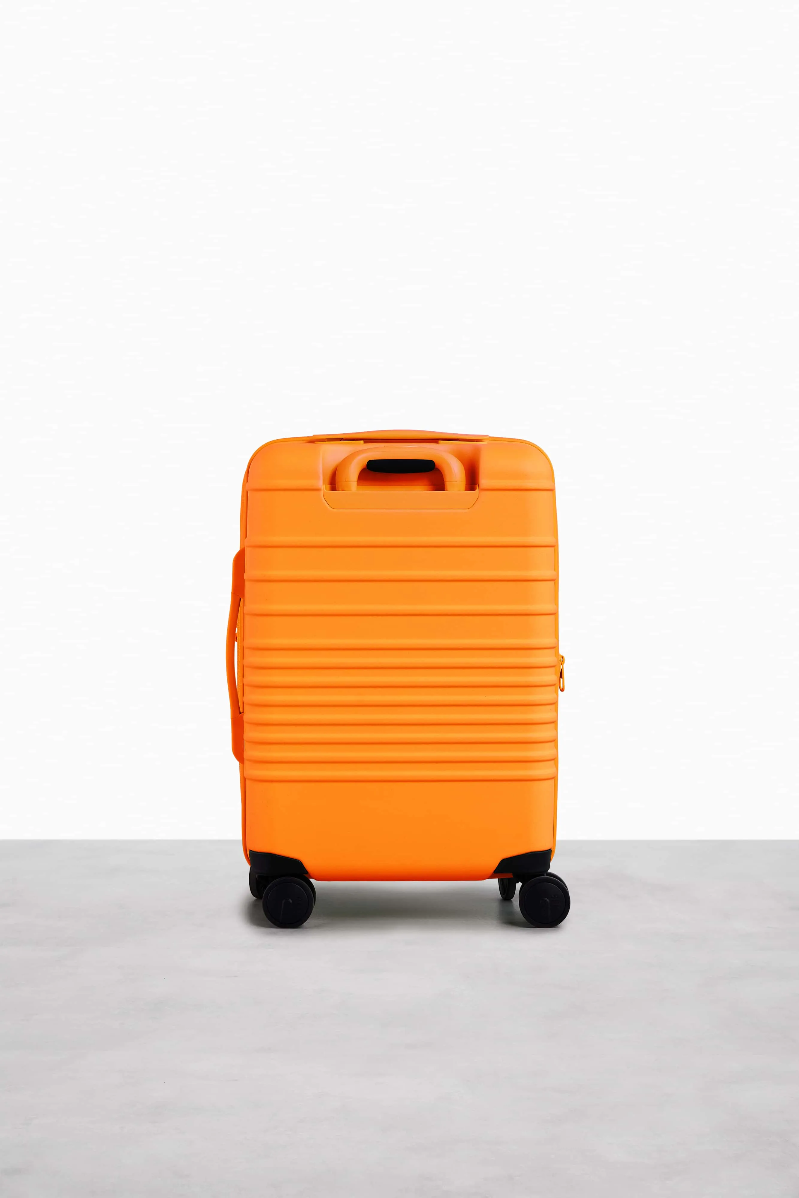 The Carry-On Roller in Creamsicle