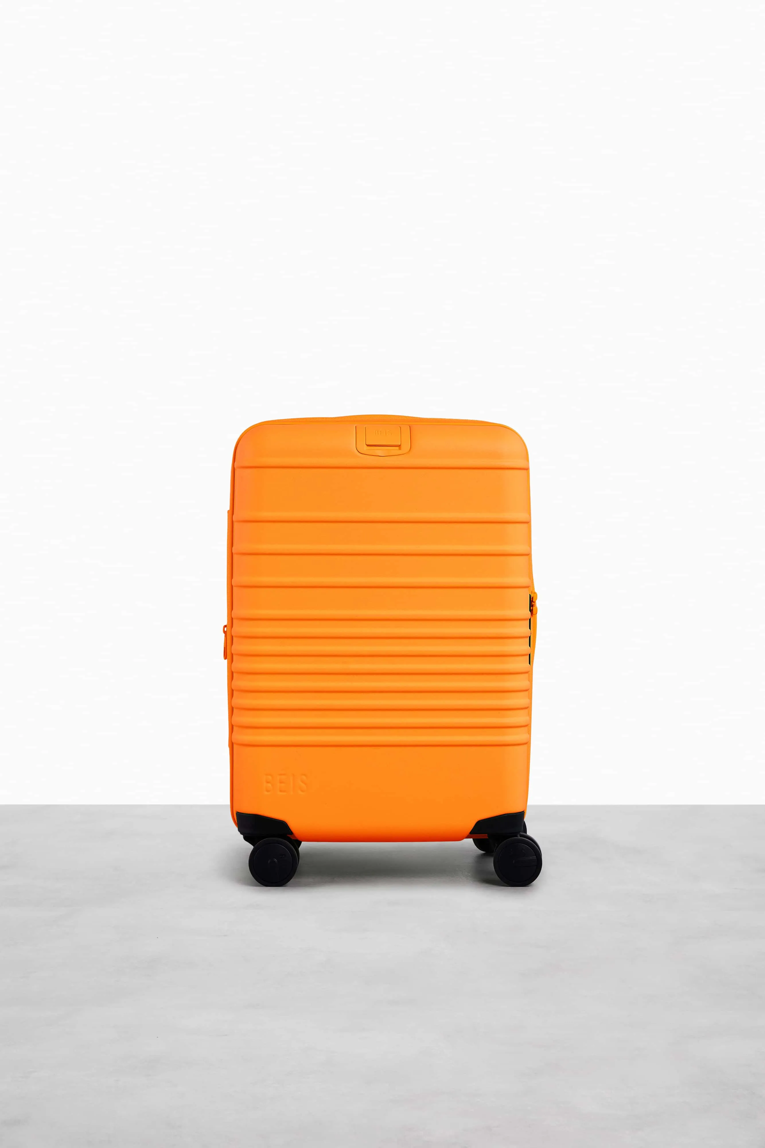 The Carry-On Roller in Creamsicle